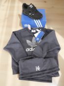 A pair of child's Adidas trainers size 10K, and a further child's Adidas tracksuit UK3/4 years,