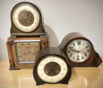 Four Art Deco mantel clocks.
