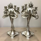 A pair of silvered composition Art Nouveau style figural candelabra, height 45 cm.