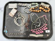 A group of costume jewellery, necklaces, coin bracelet,