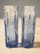A pair of Ravenhead bark textured blue glass vases, height 16.5 cm.