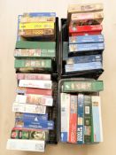A large quantity of jigsaws and puzzles.