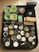 A collection of antique and modern pocket watches, various parts and components, tools, etc.