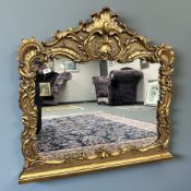 A Rococo style reproduction mirror, 95 cm x 95 cm.