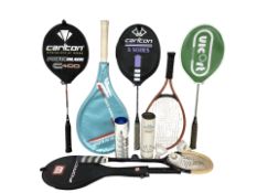 A group of tennis and badminton rackets, shuttlecocks.
