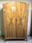 A mid-20th century burr walnut double door wardrobe, 123 cm x 50 cm x 199 cm.