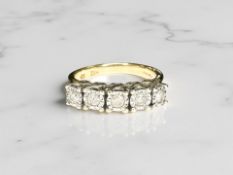 An 18ct yellow gold five stone diamond ring, the stated total diamond weight 0.25 carat, size M.