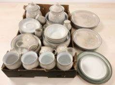 A collection of Denby Potter table wares in two colour ways.