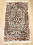 A Tabriz rug, 122 cm x 72 cm.