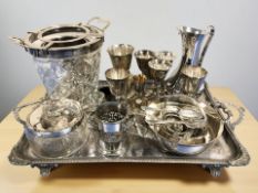 An EPNS twin-handled serving tray, width 56 cm, together with an ice bucket, various cutlery,