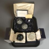 A Caithness trio glass paperweight set, with certificate numbered 628 of 750,