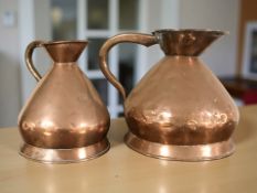 A Victorian copper one gallon jug and further half gallon jug,