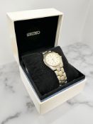 A Gent's bi-coloured stainless steel Kinetic wristwatch, boxed.