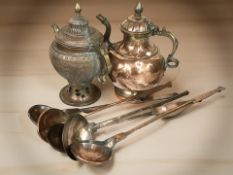 A 19th century copper kettle, a further heavily embossed brass copper kettle, and five ladles.