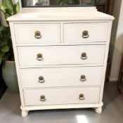 An early 20th century painted pine five drawer chest,