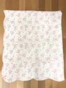 A machine stitched floral double quilt, approximately 224 cm x 200 cm.