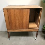 A 20th century teak tambour front TV cabinet, 75 cm x 40 cm x 85 cm.