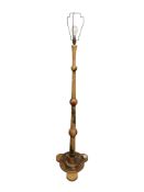 An early 20th century painted standard lamp
