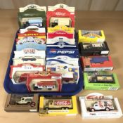 A collection of Lledo and other boxed die cast vans and delivery vehicles, in boxes.