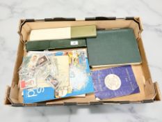 A group of philatelic items to include dictionary of world stamps,