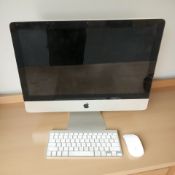 An Apple iMac Model A1311 Serial No. WQ02810UDAS, with power lead, keyboard and a wireless mouse.