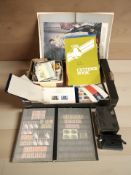A quantity of maps, Brownie camera, Player's and Wills's cigarette cards, stamp albums, etc.