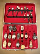 An aluminium collector's case containing twenty-six various vintage lady's and gent's wristwatches,