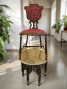 An Islamic bobbin turned and carved folding occasional table with brass top, diameter 59 cm,