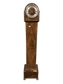 An Art Deco walnut cased Grandmother clock,