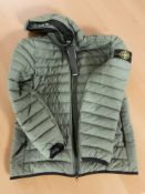 A Stone Island quilt hoodie in green, size M, retaining retail tags.