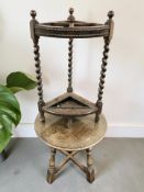 A reproduction oak circular coffee table and an Edwardian barley twist stick stand