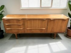 An S Form teak low sideboard fitted cupboards and drawers, 199 cm x 45 cm x 76 cm.