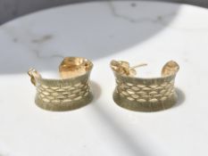 A pair of 9ct yellow gold textured concave earrings CONDITION REPORT: 2.