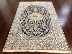 A Nain carpet, Central Iran, 301 cm x 191 cm.