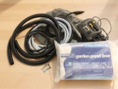 A garden pond liner, lengths of plastic hose, a composition rockery feature and an electric jigsaw.