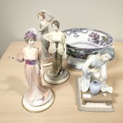 A Lladro figure of a geisha arranging flowers,