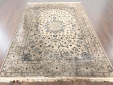 A machine-made Nain carpet, Central Iran, 360 cm x 242 cm.