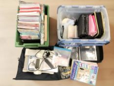 A Sizzix Bigshot silhouette cutting machine with various associated materials and craft items.