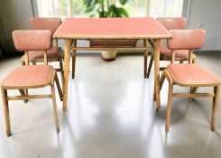 A 1950's melamine topped kitchen table, 95 cm x 66 cm x 76 cm,