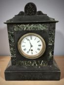 A Victorian black slate and green marble mantel clock, height 35 cm.
