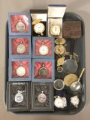 A group of modern pocket watches, magnifying glasses, compass, etc.