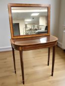 A reproduction mahogany and satin wood banded d-shaped hall table in the George III style,