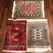 Three Lahore Bokhara rugs, Pakistan, each approx.