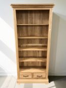 A modern oak open bookcase, 85 cm x 34 cm x 193 cm.