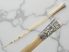 A 19th century Rhinoceros horn lady's cane, mounted in Chinese silver, length 71 cm, 97g.