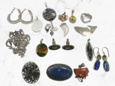 A group of Continental white metal mounted jewellery including pendants, brooches,
