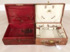Two vintage leather cases.