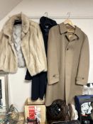 A lady's mink jacket, two further coats, a fur hat, a Radley handbag, and a crocodile skin bag.