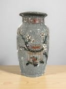 A Japanese crackle glazed earthenware vase, height 19 cm.