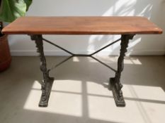A cast iron framed rectangular side table, width 110 cm.